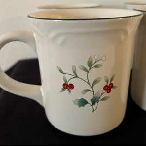 4 like new Pfaltzgraff “Winterberry” mugs. 13oz